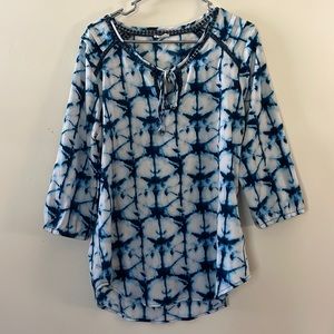 Blue and white blouse.